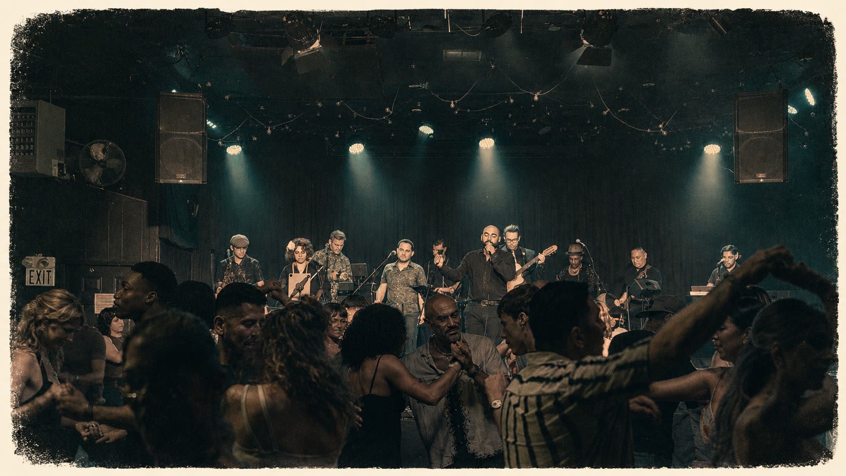 Guajirón's full orchestra performing as couples dance at La Peña Cultural Center